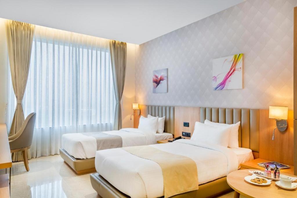 Hotel Plaza International Near Delhi Airport نيودلهي الغرفة الصورة